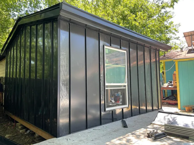 Black standing seam metal wall panels for Roof Inspection in Oakland